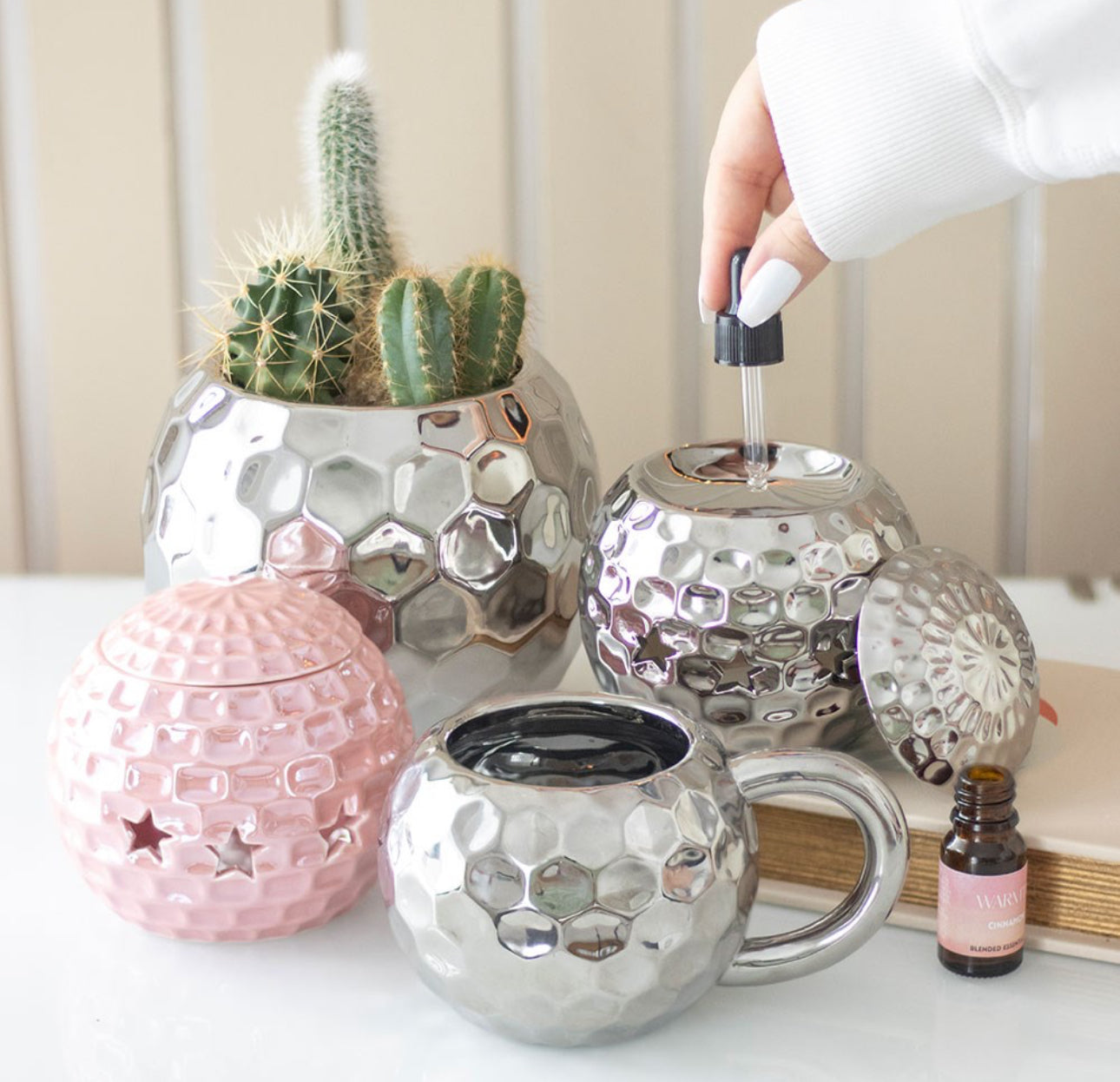 QUEMADOR DE ACEITE CON BOLA DE DISCOTECA ROSA
