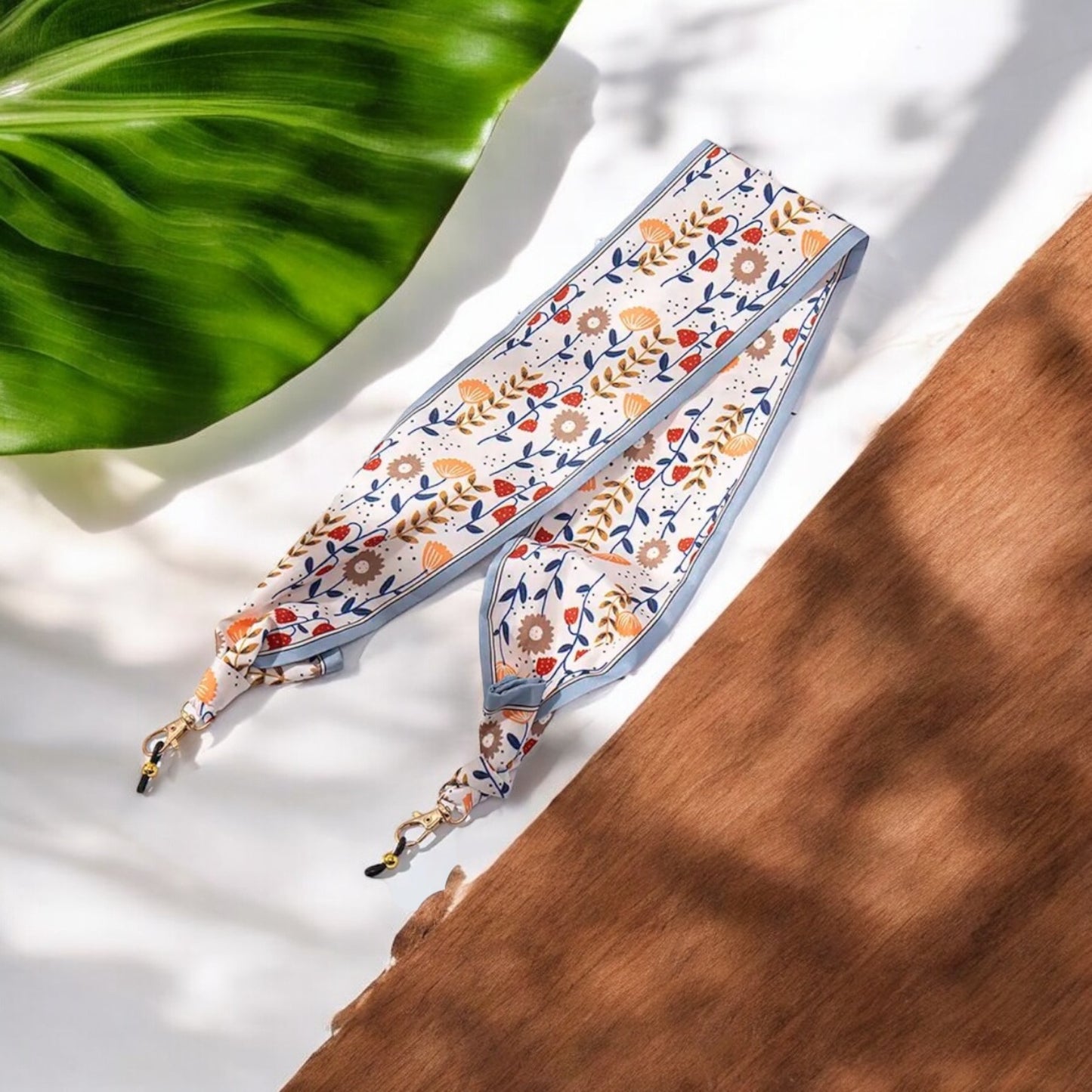 Cuelga móvil/gafas floral