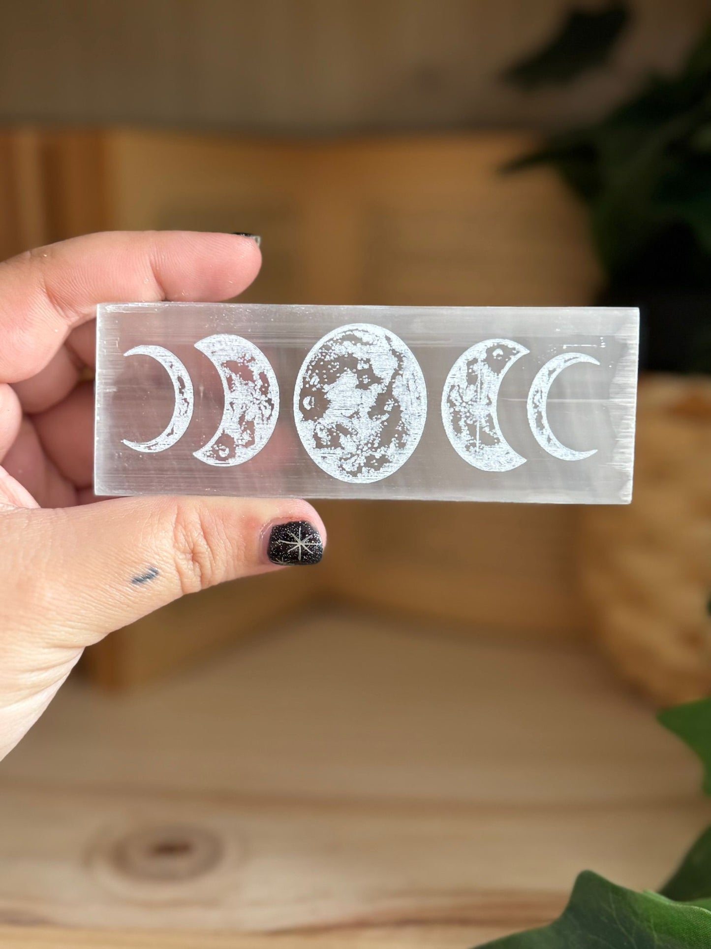 Placa de selenita con fases lunares