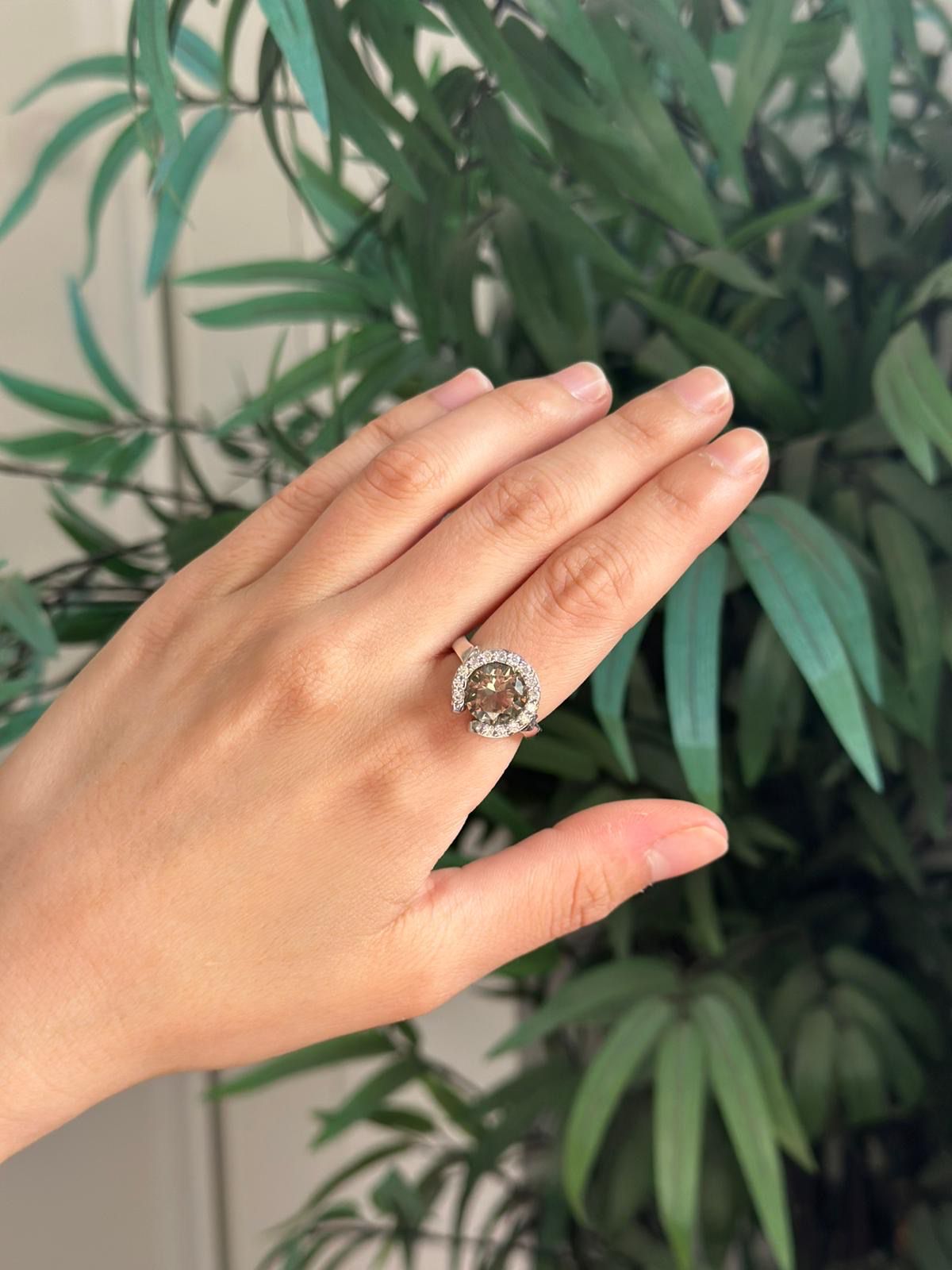 Anillo de plata con olivino peridoto y circonitas - talla 15