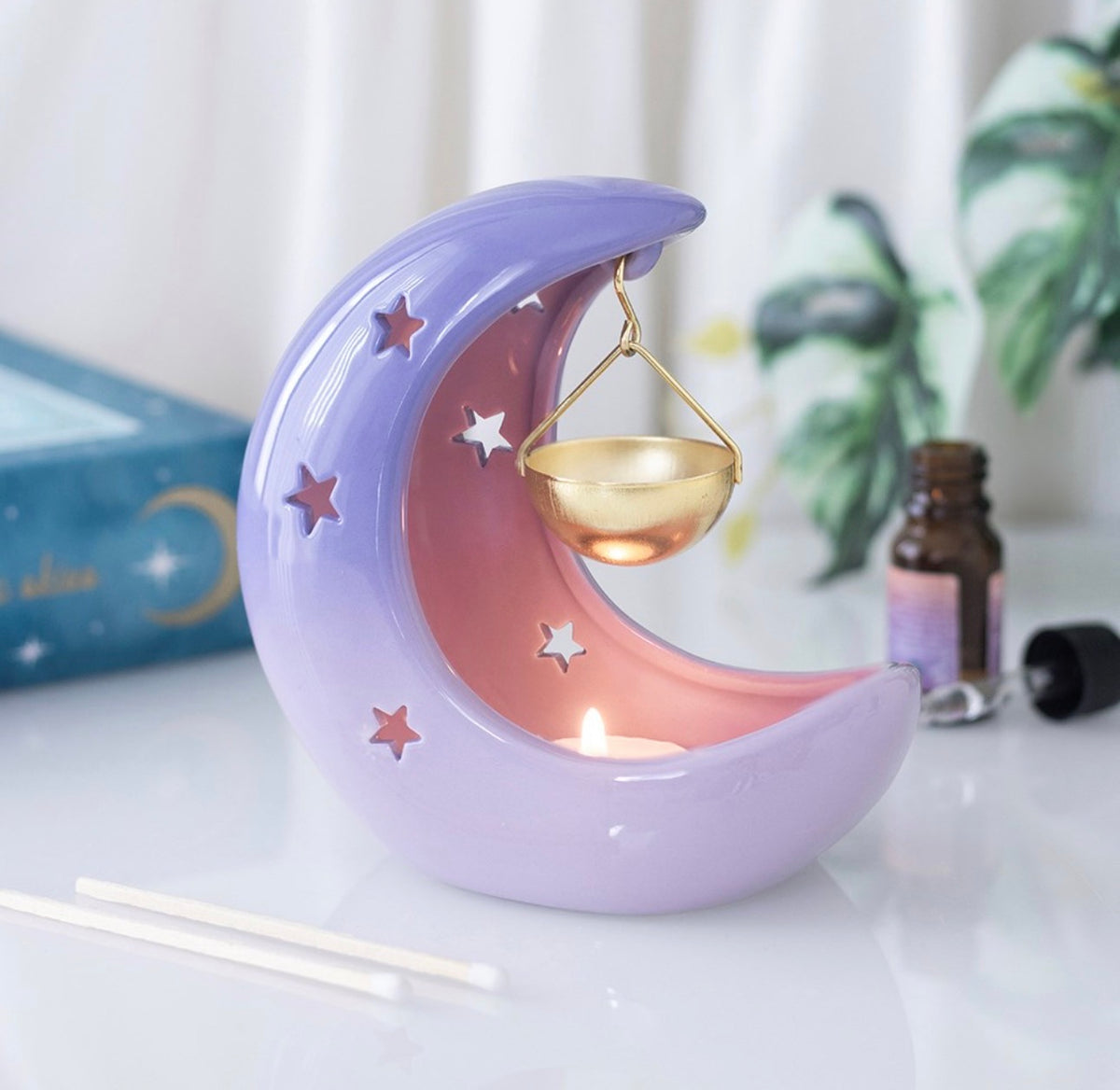QUEMADOR DE ACEITE COLGANTE CON FORMA DE LUNA CRECIENTE EN COLOR MORADO PASTEL