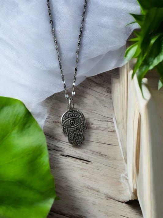 Colgante de plata mano de Fátima con ojo turco