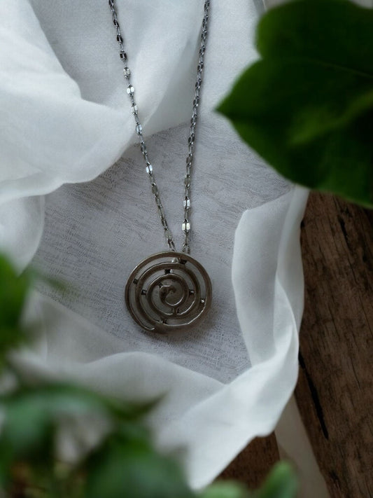 Colgante de plata espiral