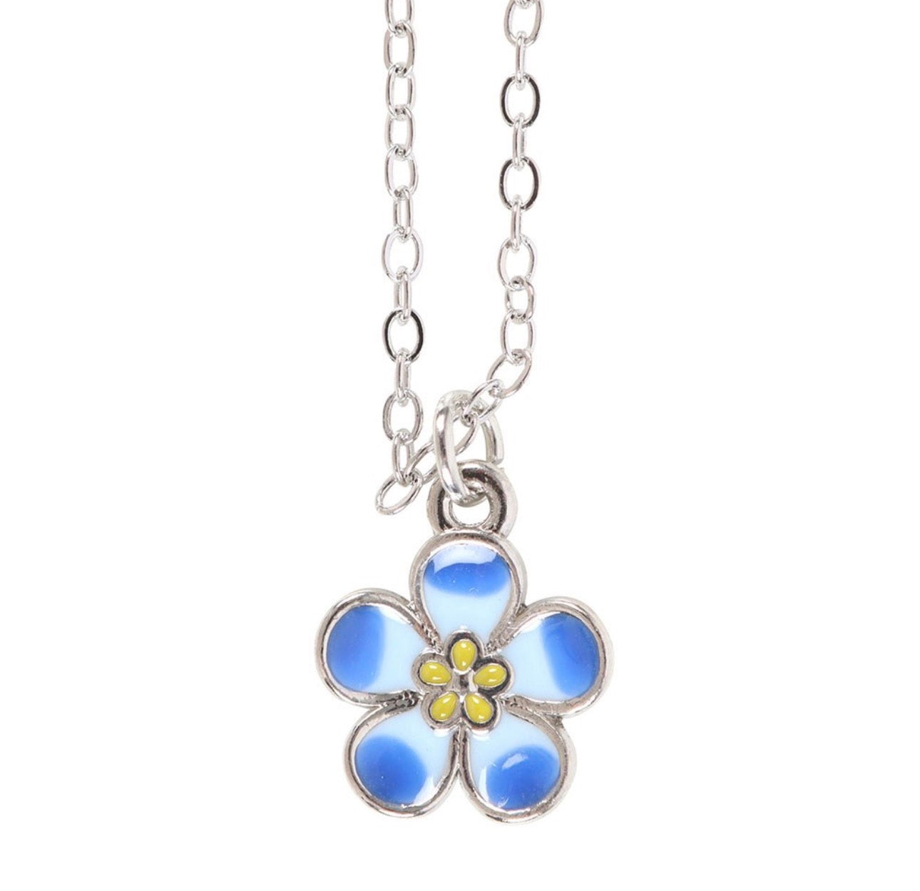 COLLAR DE FLORES DE NOMEOLVIDES EN TARJETA DE FELICITACIÓN
