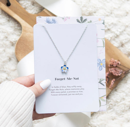COLLAR DE FLORES DE NOMEOLVIDES EN TARJETA DE FELICITACIÓN