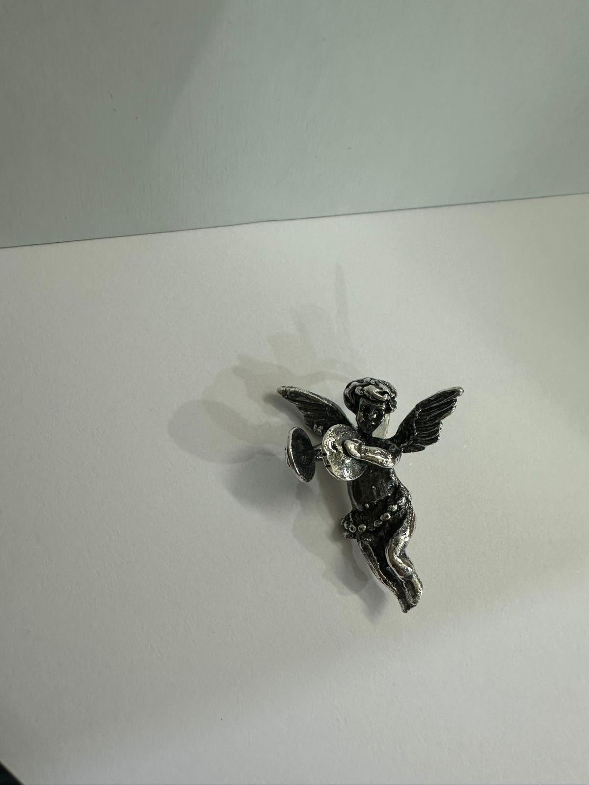 Ángeles de plata (colgantes)