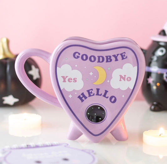 TAZA DE CERÁMICA CON FORMA DE OUIJA EN TONOS PASTEL