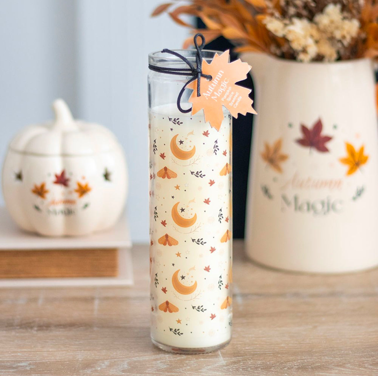 Vela mágica de calabaza y especias en forma de tubo de otoño