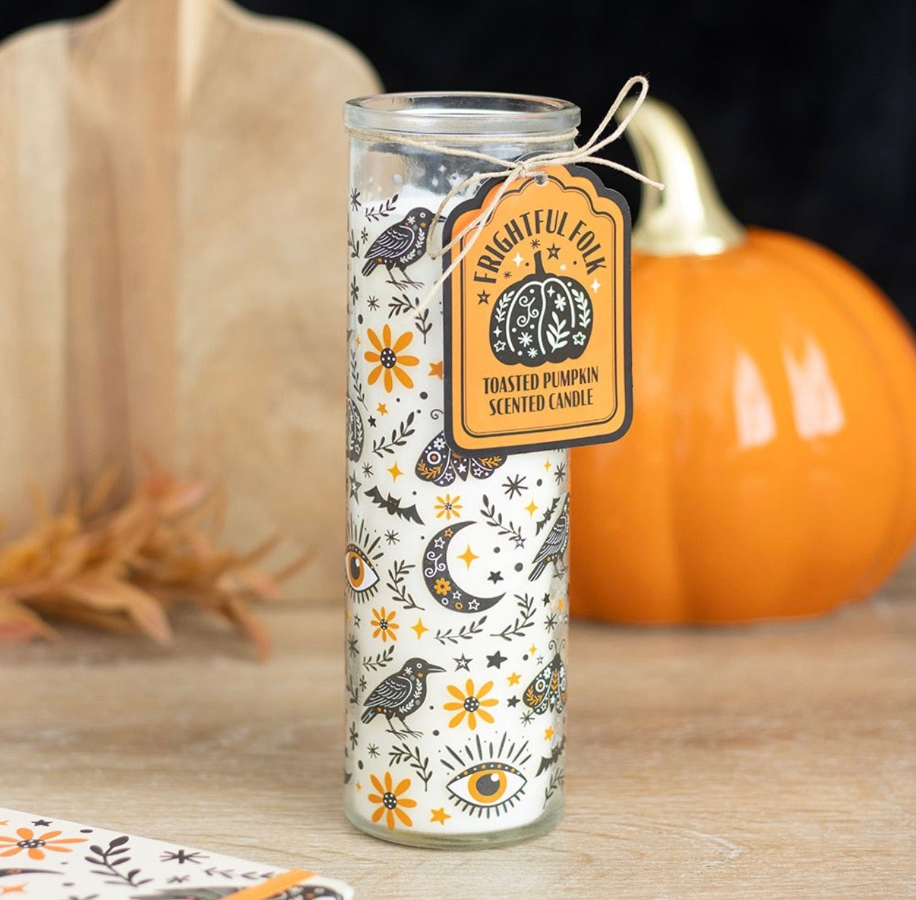 Vela tubo con aroma a calabaza tostada con estampado folclórico