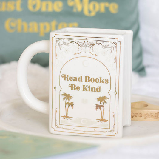 Taza blanca con forma de libro "Lee libros, sé amable"