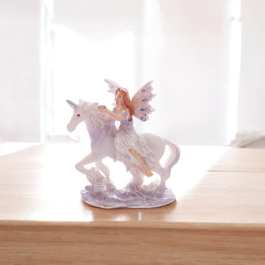 Figura Hada Hada Floral Lila y Brillante con Unicornio