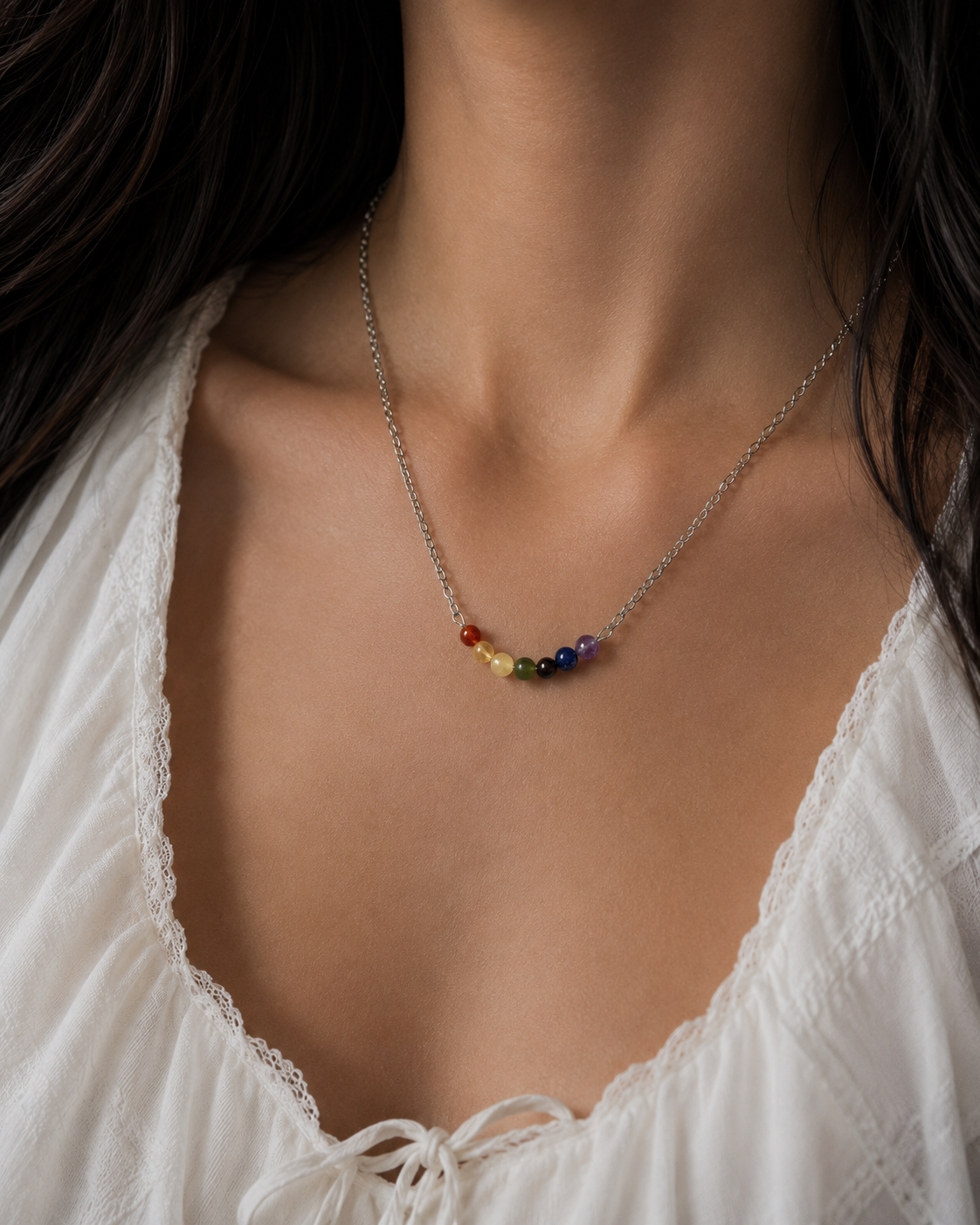 Colgante de acero con minerales de los 7 chakras
