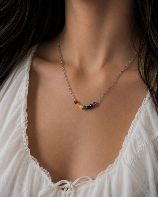 Colgante de acero con minerales de los 7 chakras