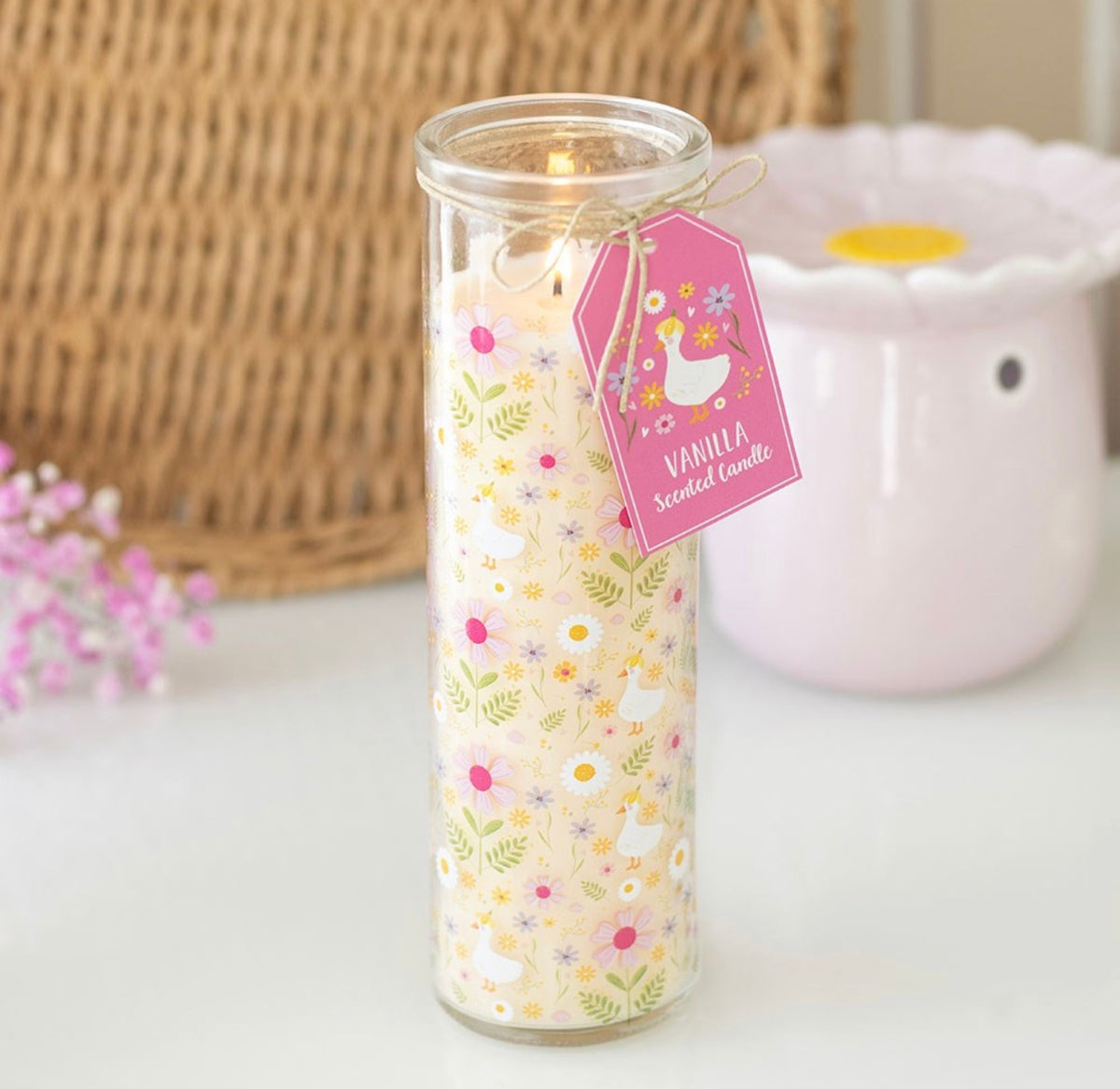 VELA DE TUBO DE VAINILLA CON ESTAMPADO DE MARGARITAS Y PATITOS