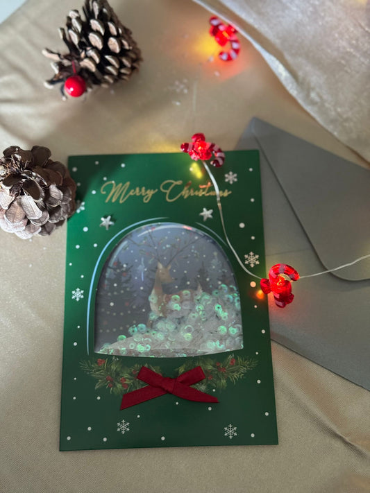 Postal Mágica de Navidad – Bola de Nieve con Purpurina y Dibujo Escondido + sobre