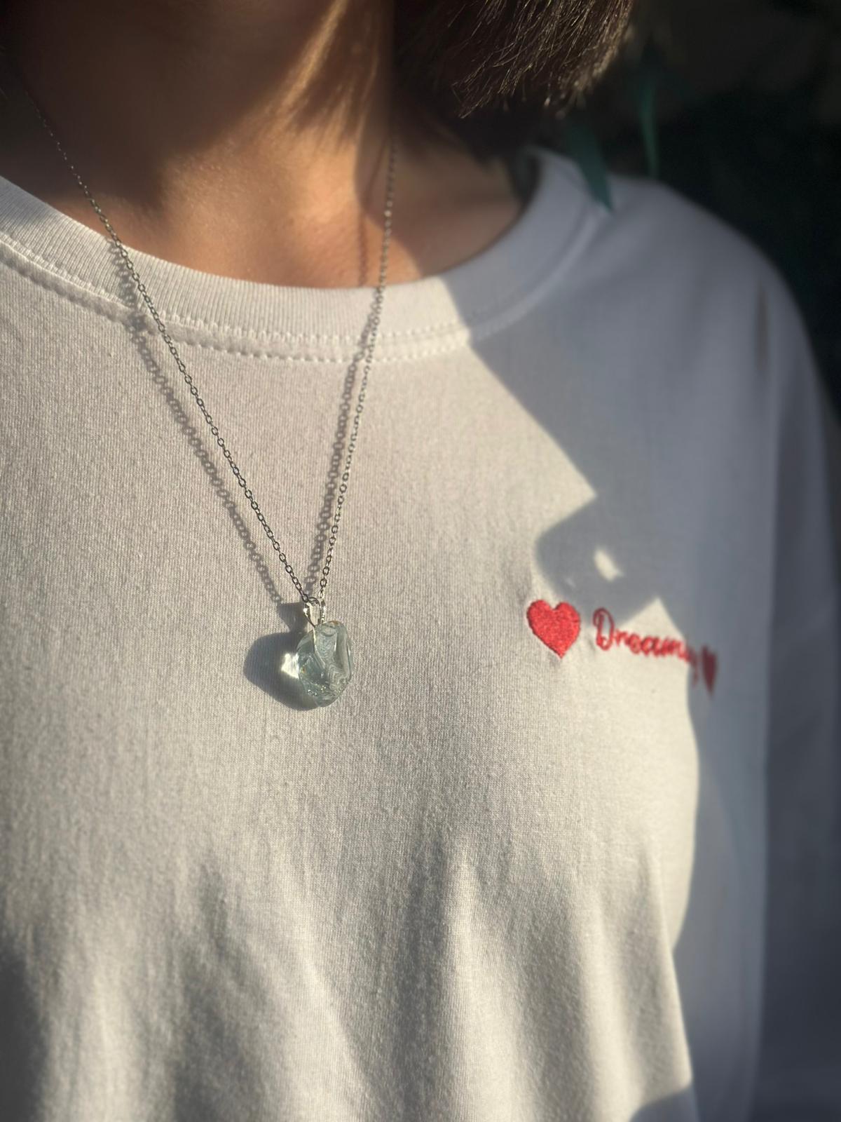 Colgante de plata con topacio azul rodado