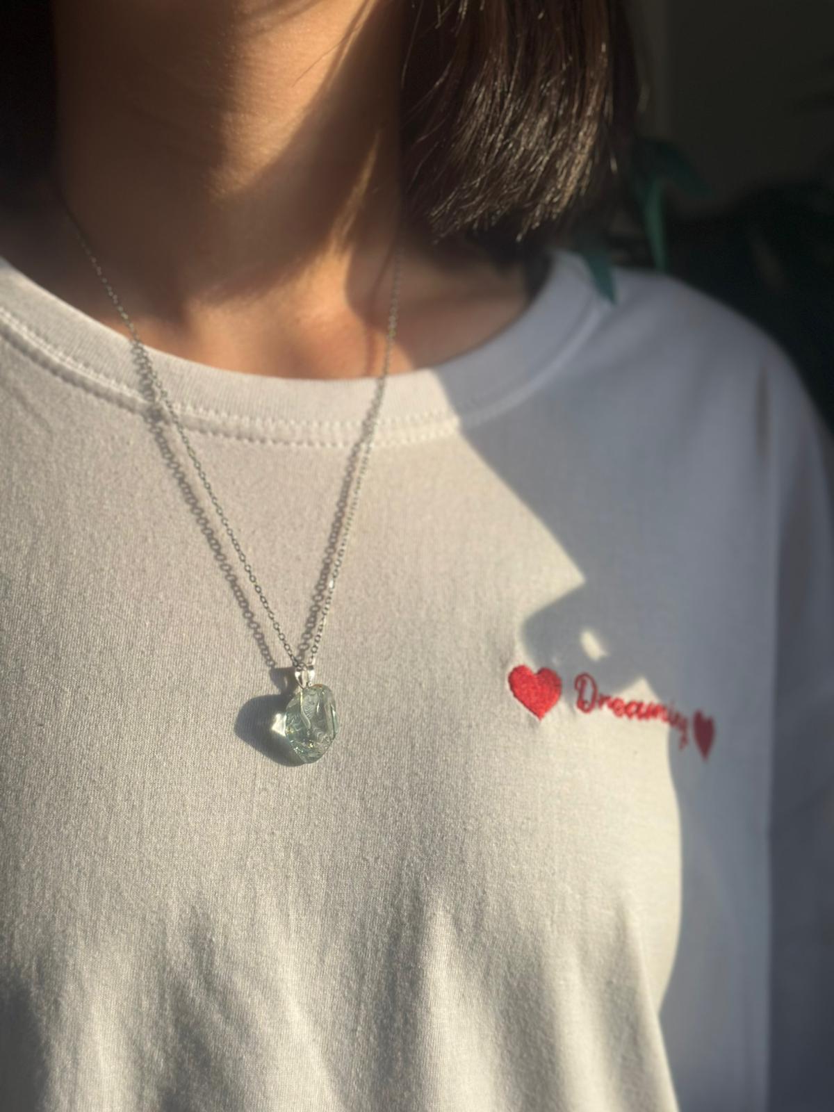 Colgante de plata con topacio azul rodado