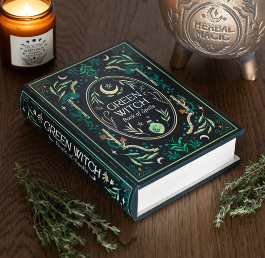 Caja de almacenamiento con forma de libro de la bruja verde.