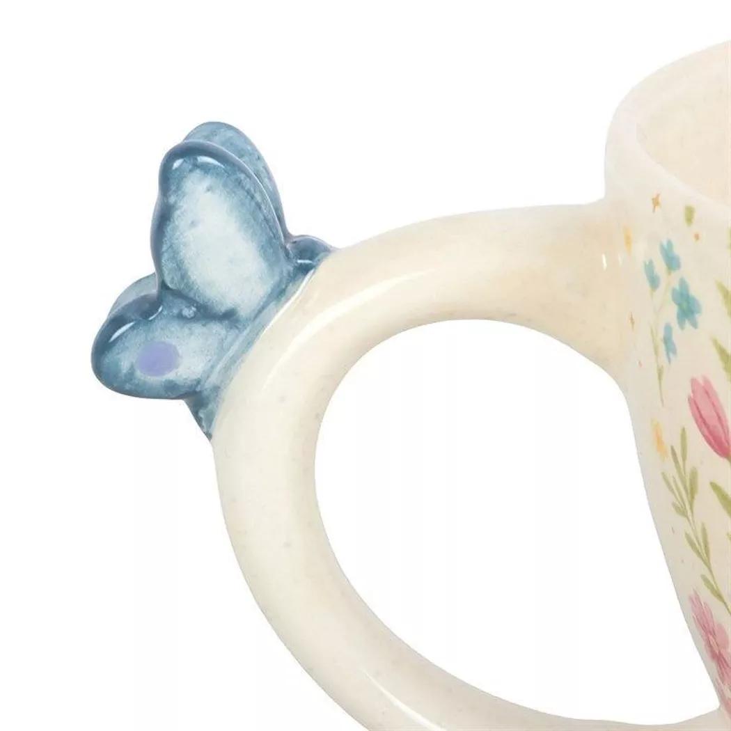Taza con estampado floral y mariposa Luna Bloom.