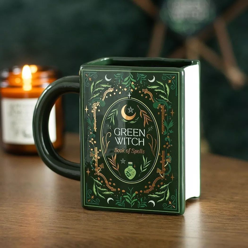 Taza en forma de libro de la bruja verde.
