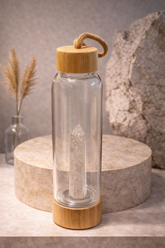 Botella con punta de cuarzo blanco