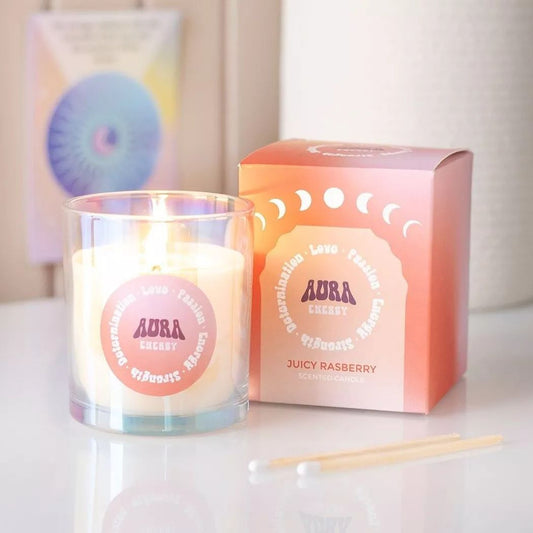 Vela iridiscente Aura energía con aroma a frambuesa jugosa.
